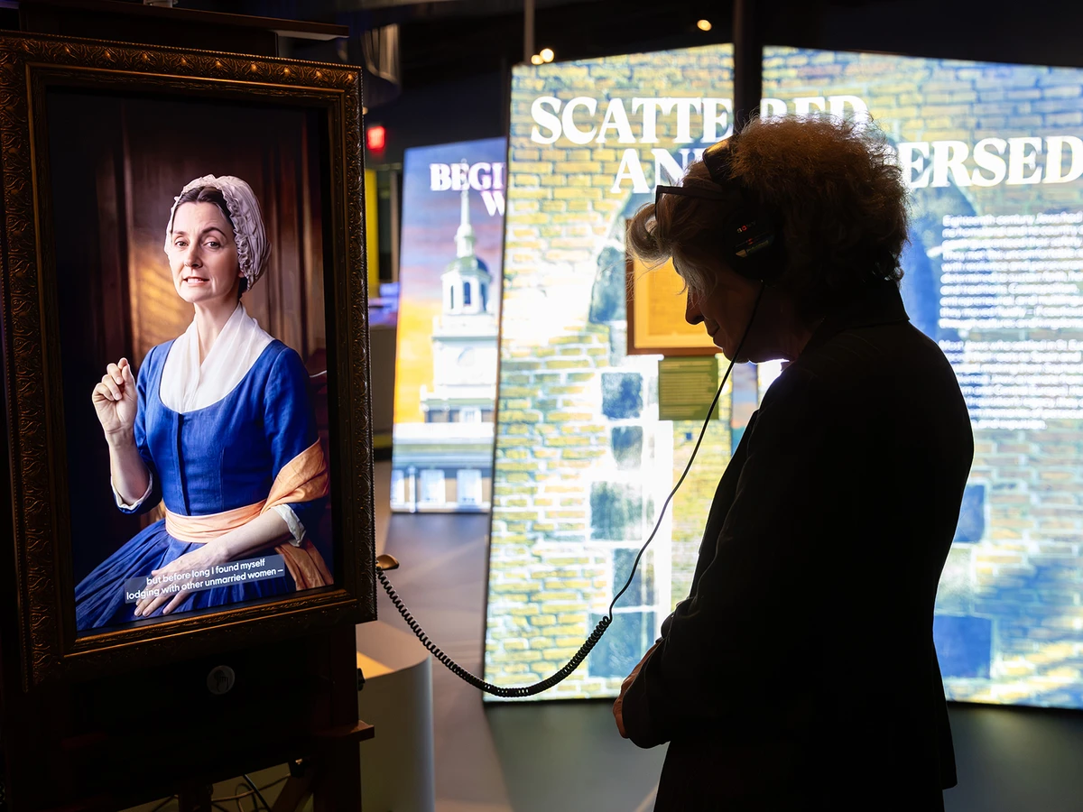A guest at The Weitzman National Museum of American Jewish History's exhibition The First Salute. Photo by Christopher Brown / Shoot From Within Photography.&nbsp;