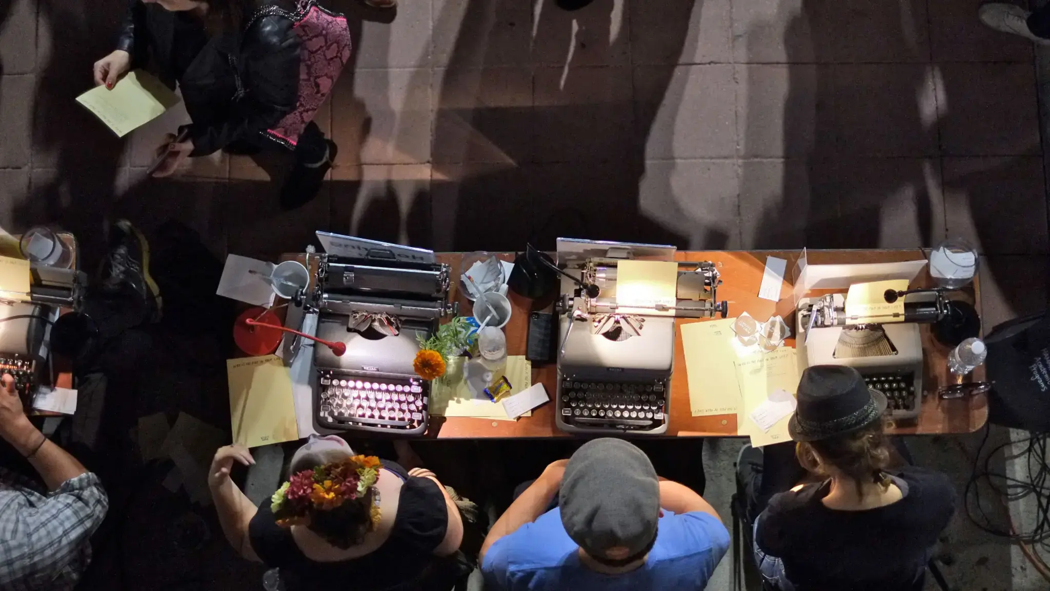 A &ldquo;Poetry Bureau,&rdquo; created by the Center for the Art of Performance at UCLA, Westwood Village, 2013. Featuring a group of volunteer poets who write a spontaneous verse for visitors, the bureau appears outside the theater prior to a related performance. Photo by Phinn Sriployrung&nbsp;