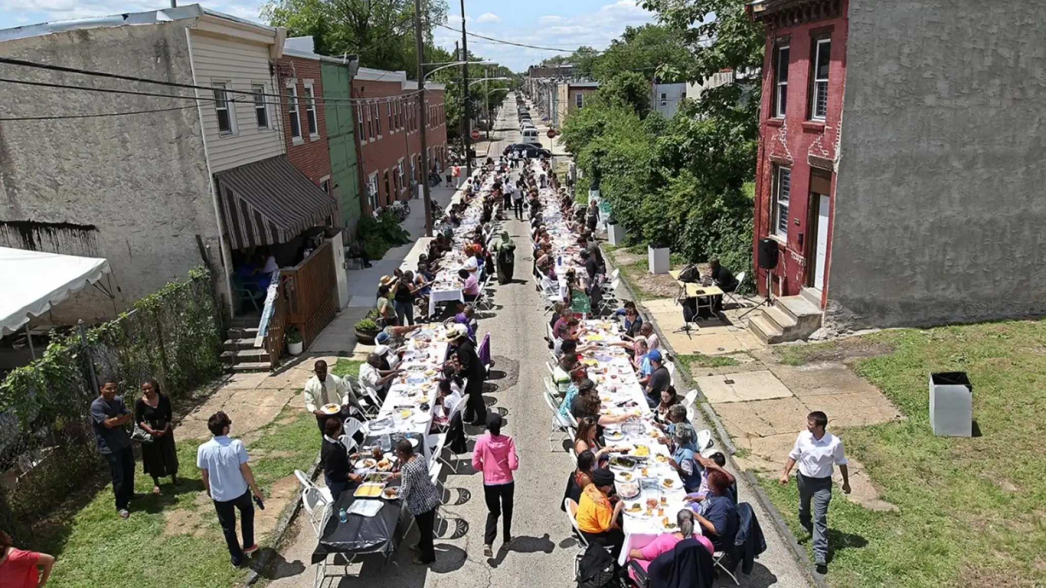 After Temple Contemporary&#39;s Funeral for a Home community procession, guests were invited to a sit-down reception for 300 on Melon Street. Photo courtesy of Al Jazeera America.