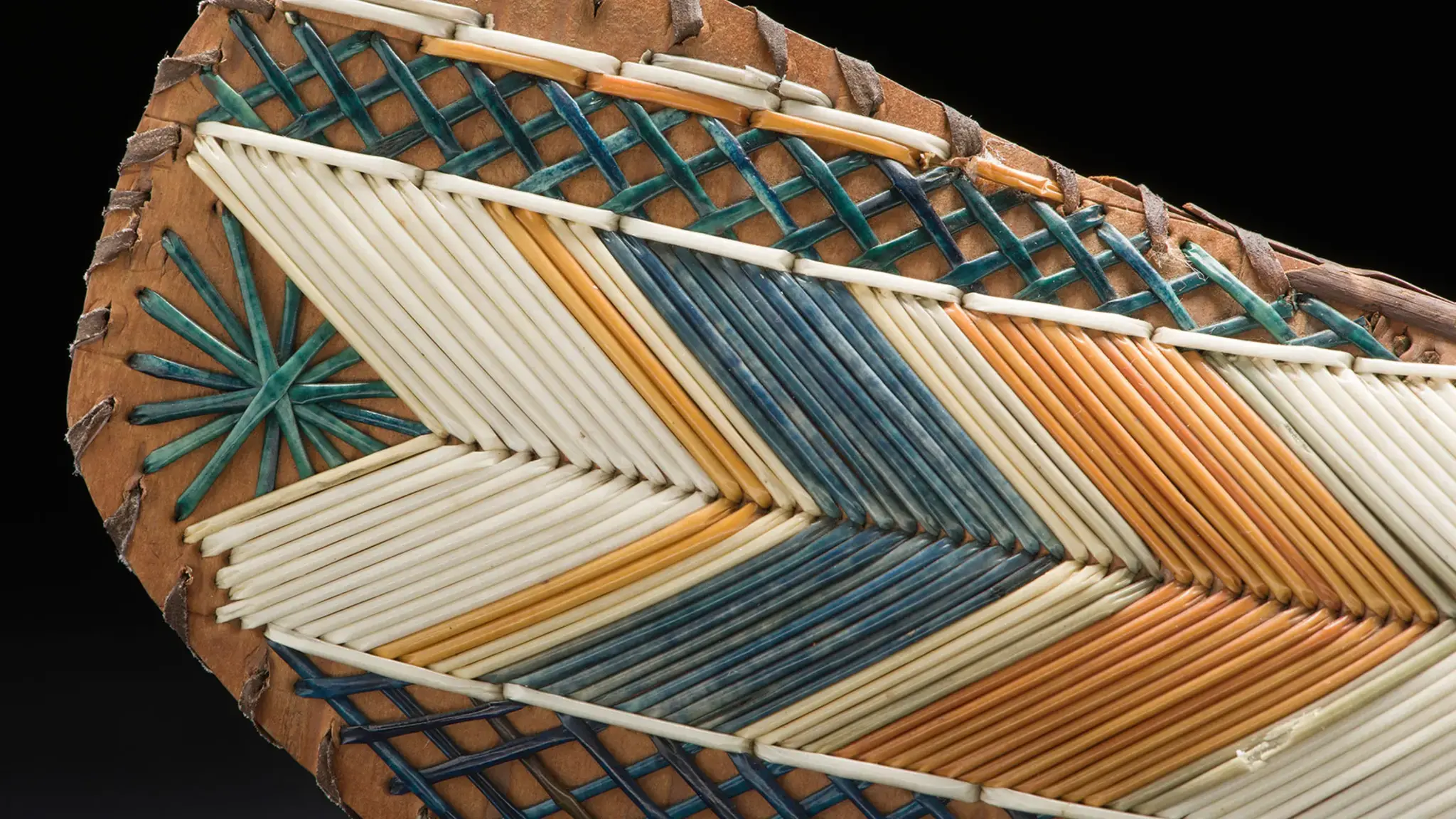 Detail of a model canoe, on view at the Abbe Museum in Bar Harbor, Maine. Photo courtesy Peabody Essex Museum.