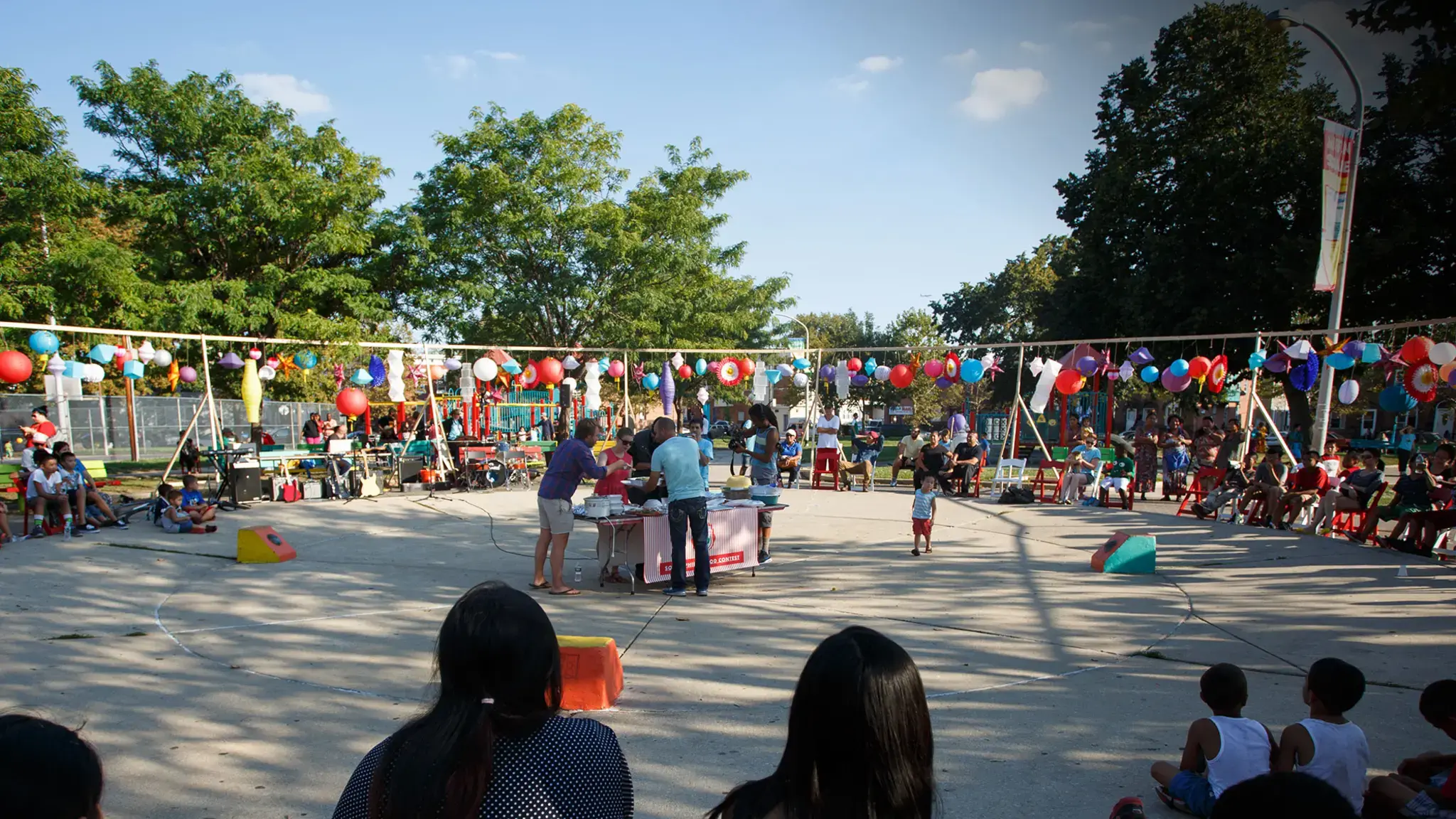 Community members partake in Mifflin Square Alliance Festival in September 2015, part of Mural Art Program&rsquo;s Playgrounds for Useful Knowledge. Photo by Steve Weinik.