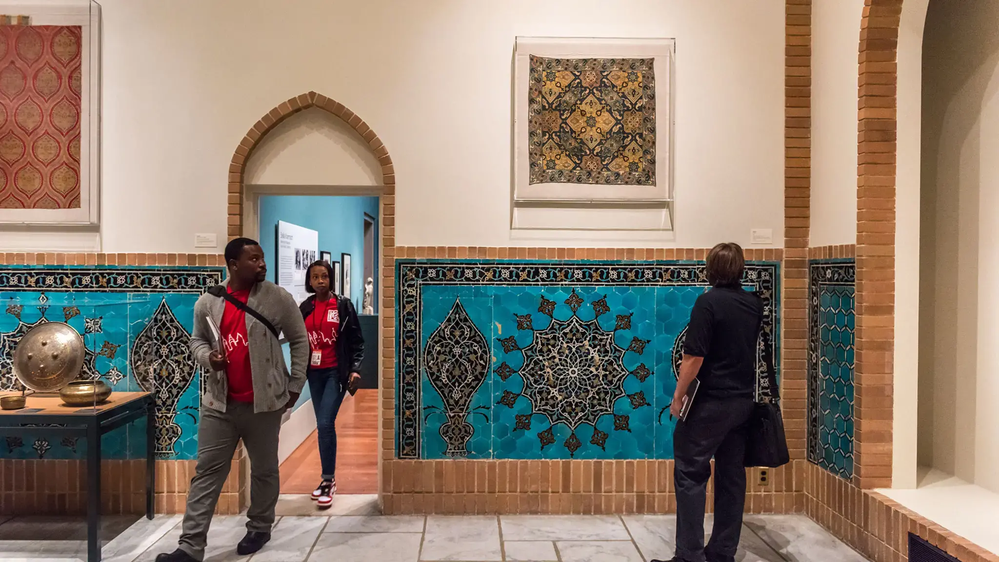 Mosaics and woven textiles capture the attention of visitors wandering in the Safavid Court. Photo courtesy of Philadelphia Museum of Art.