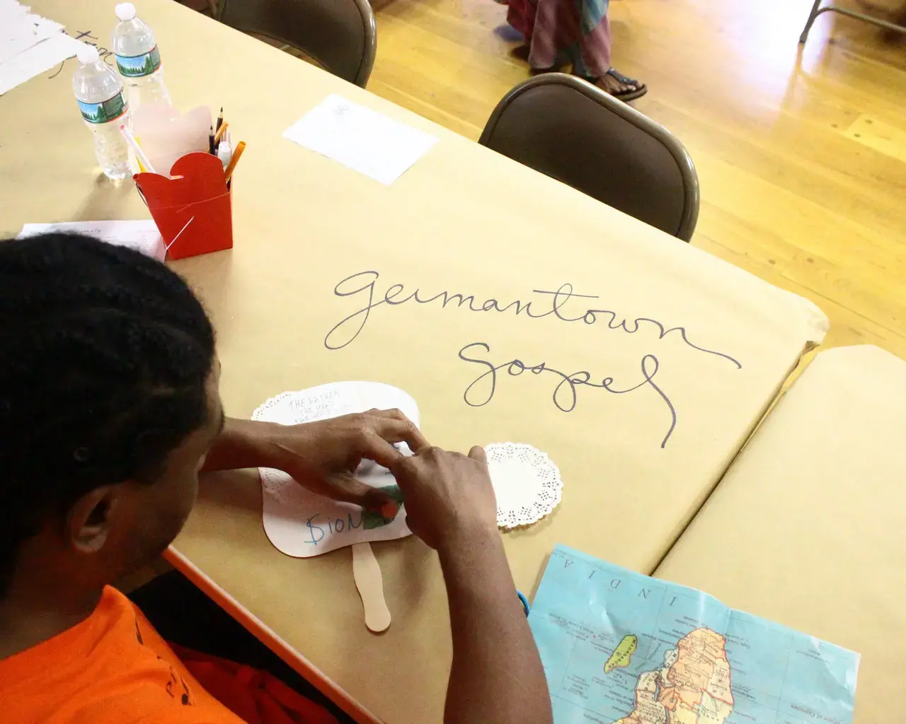 Historic Germantown&rsquo;s story circle and paper fan-making workshop with Yolanda Wisher. Photo by Jill Saul.