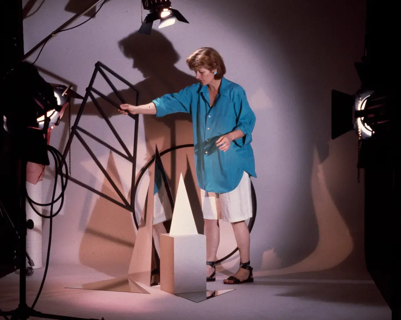 Documentation of Barbara Kasten working in her studio, New York, NY, 1983. Photo courtesy of the artist.