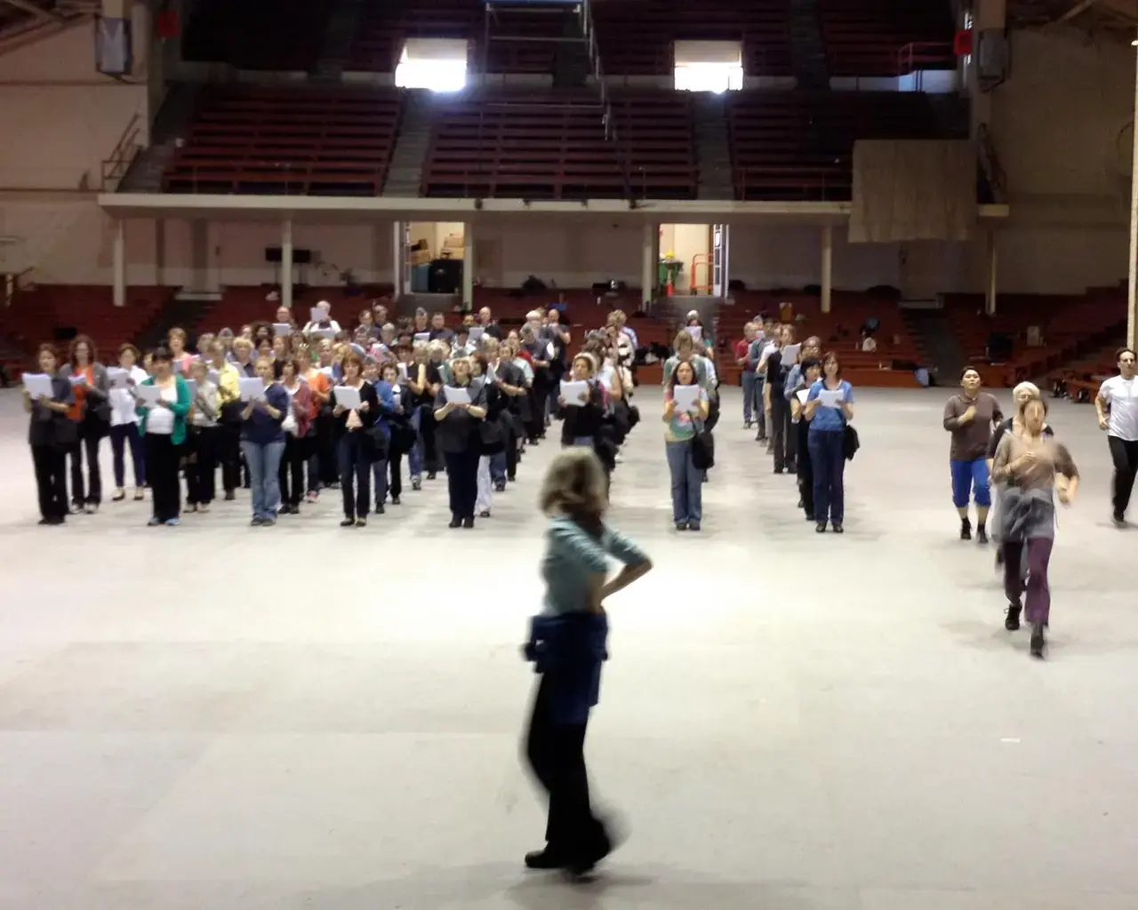 Leah Stein directs Battle Hymns&nbsp;singers and dancers at Kezar Pavilion in April 2013, set to a libretto based on Civil War texts. Photo by Sidney Chen.