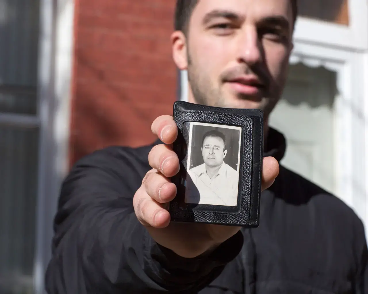 Hakan Ibisi carries a photograph of his grandfather in his wallet. Ibisi was photographed for the Philly Block Project, a collaboration between the Philadelphia Photo Arts Center and Hank Willis Thomas. Photo by Wyatt Gallery/Hank Willis Thomas Studio, 2015.