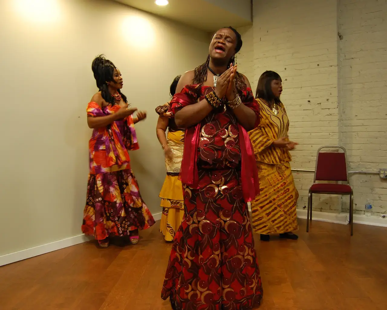 Fatu Gayflor in performance with the Liberian Women&#39;s Chorus for Change at he Cedar Works, Philadelphia, 2013. Photo by Toni Shapiro-Phim.