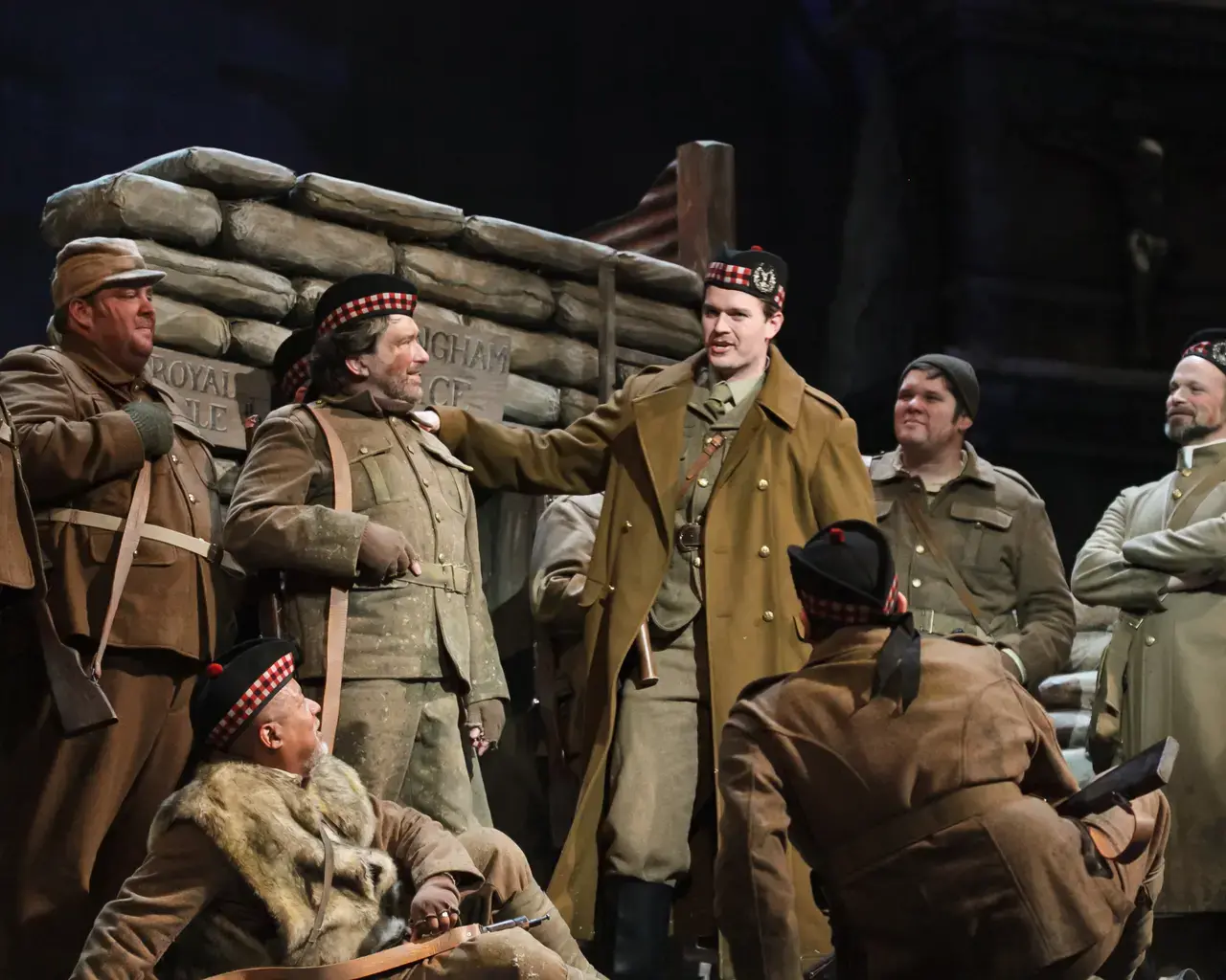 Scottish troops gather around Lieutenant Gordon (Gabriel Preisser) in Opera Philadelphia&rsquo;s East Coast premiere of the Pulitzer Prize-winning opera Silent Night. Photo by Dominic M. Mercier.