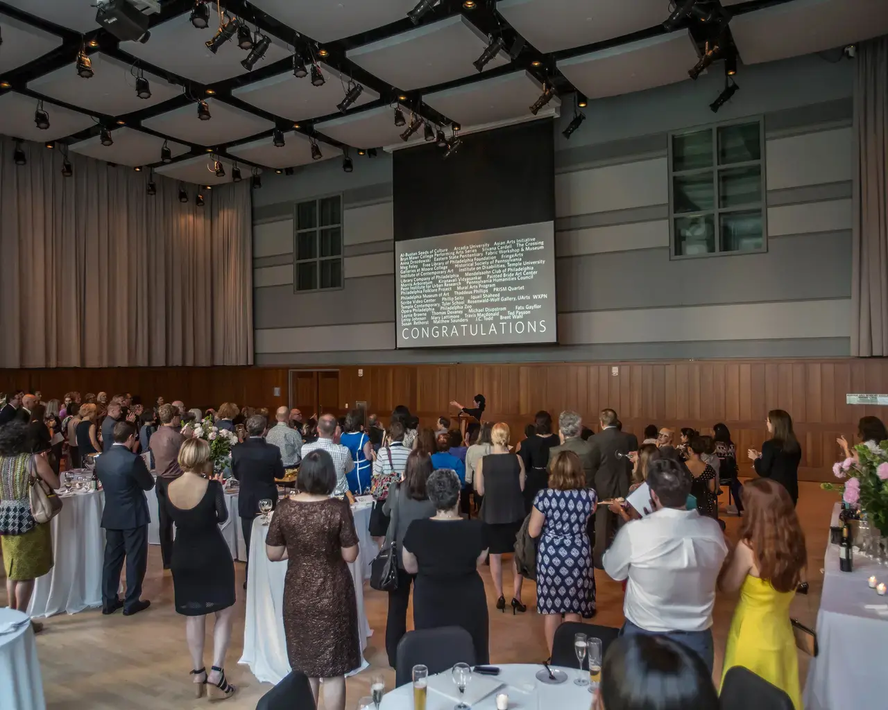 Paula Marincola, Executive Director of The Pew Center for Arts &amp; Heritage, announces and toasts the 2014 grantees. Photo by Kevin Monko.