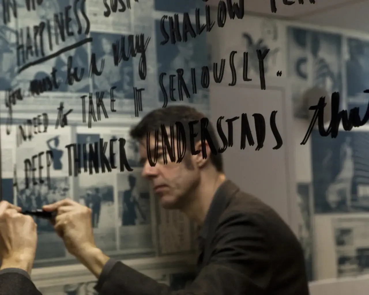 Stefan Sagmeister, working on a display for The Happy Show. Image courtesy of the Institute of Contemporary Art, University of Pennsylvania.