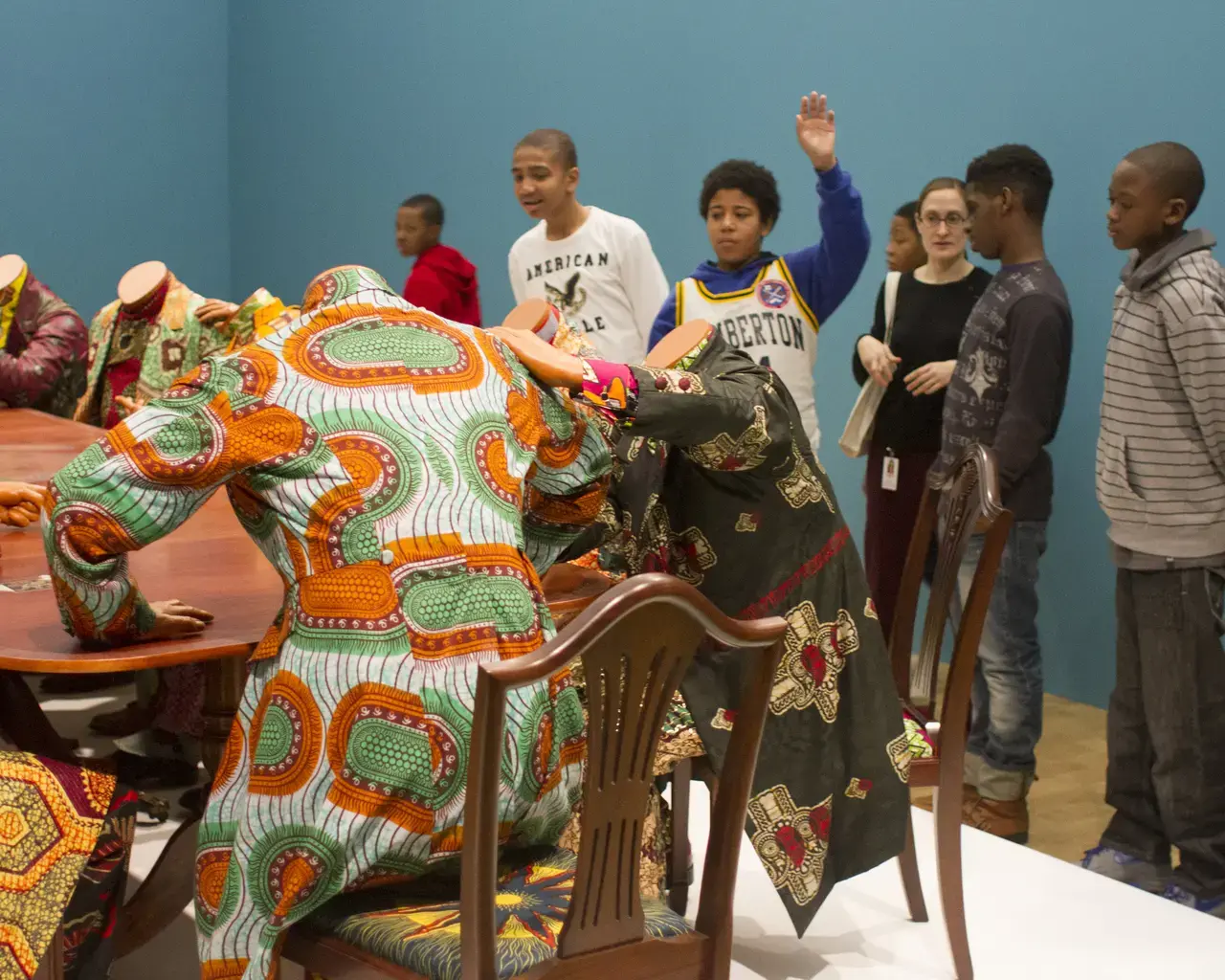 Philadelphia students viewing Yinka Shonibare&#39;s, Scramble for Africa, 2004. Photo courtesy of The Barnes Foundation.