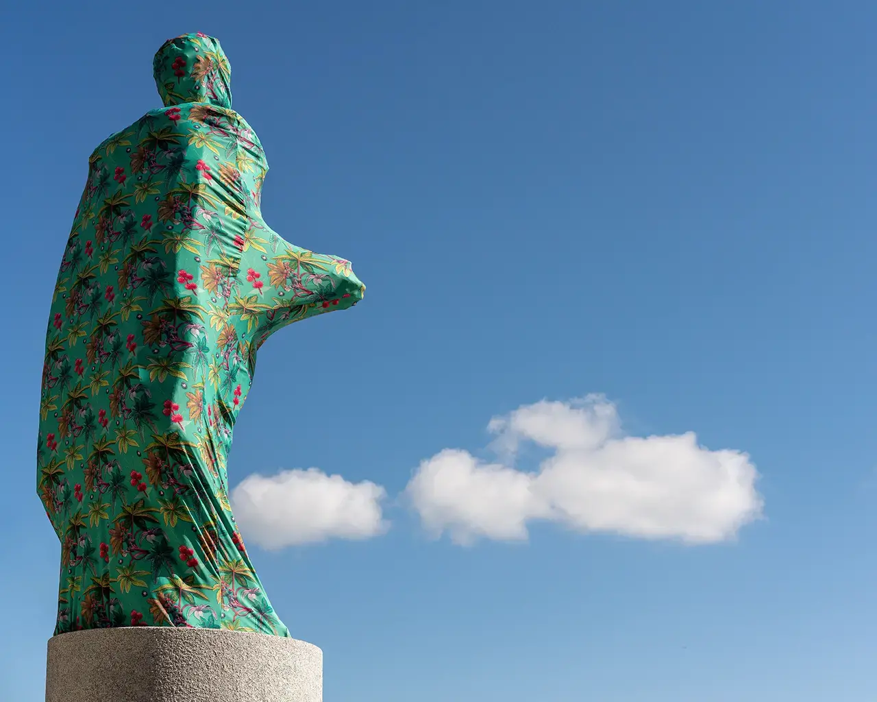 Joiri Minaya, The Cloaking of the statue of Christopher Columbus behind the Bayfront Park Amphitheatre, 2019; dye-sublimation print on spandex fabric and wood structure; Miami, FL. Commissioned by Fringe Projects Miami. Photo by Zachary Balber, courtesy of the artist.