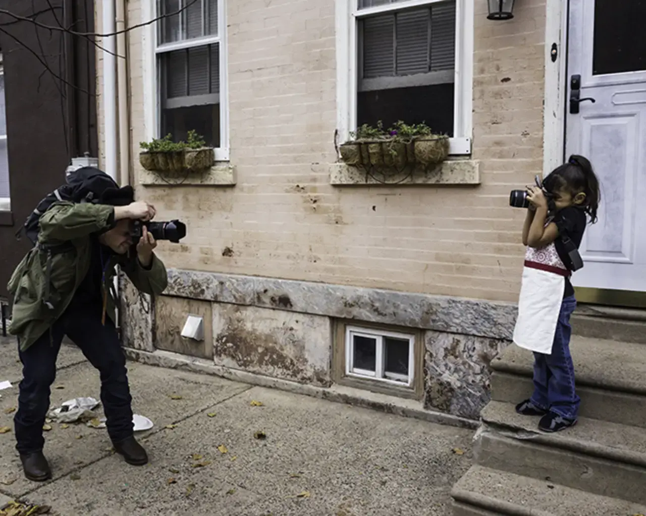 Will Steacy and Layla Perea photographed each other in November, 2015, for the Philly Block Project. Steacy is one of the collaborating artists for the Philly Block Project and Perea is a South Kensington resident. Photo by Jordan Baumgarten/Philly Block Project, 2015.