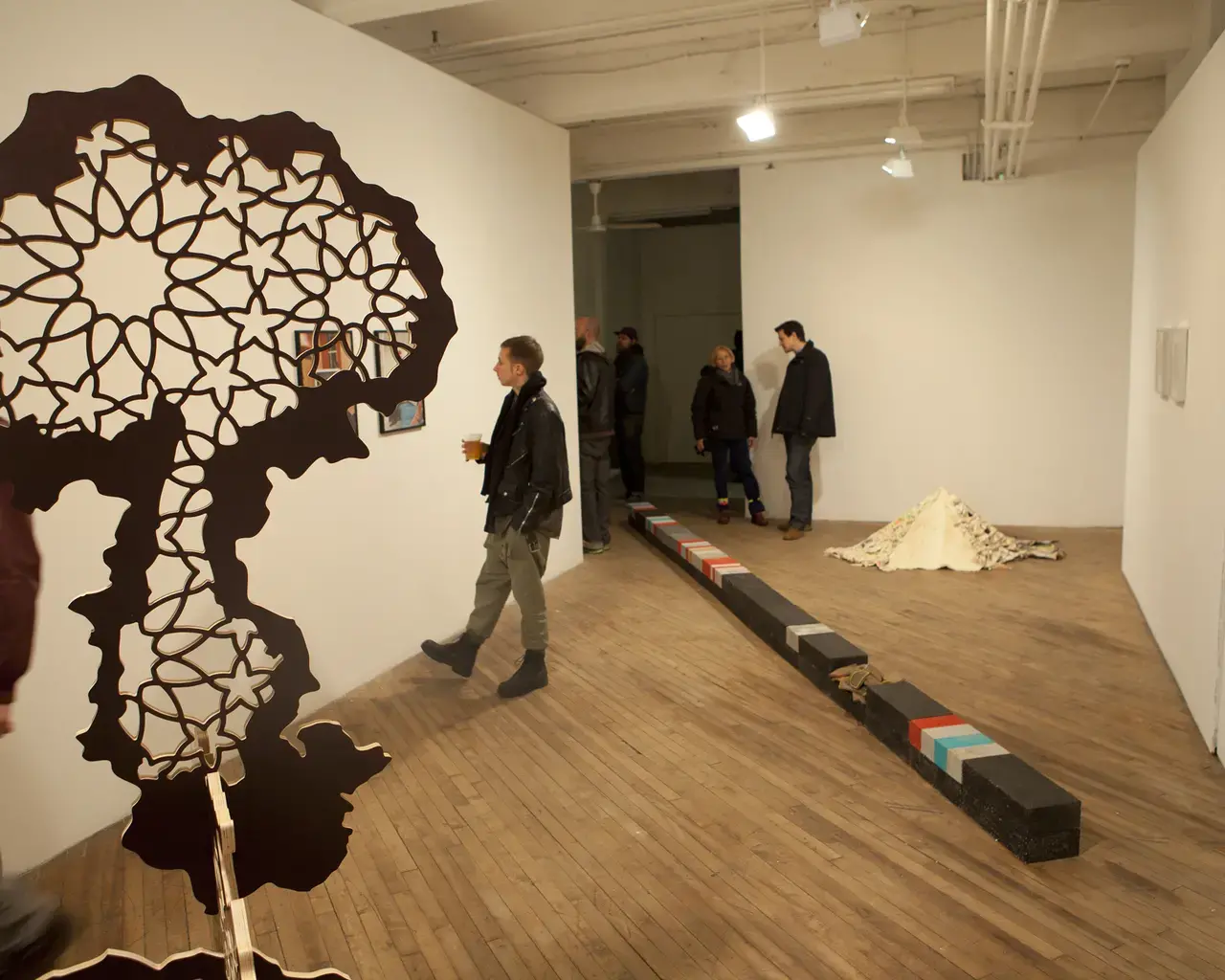 From left: Sherin Guirguis, Mashrabeya, plywood, 2009. Kianja Strobert, Color Line, sculpture, 2010. Photo courtesy of Vox Populi.
