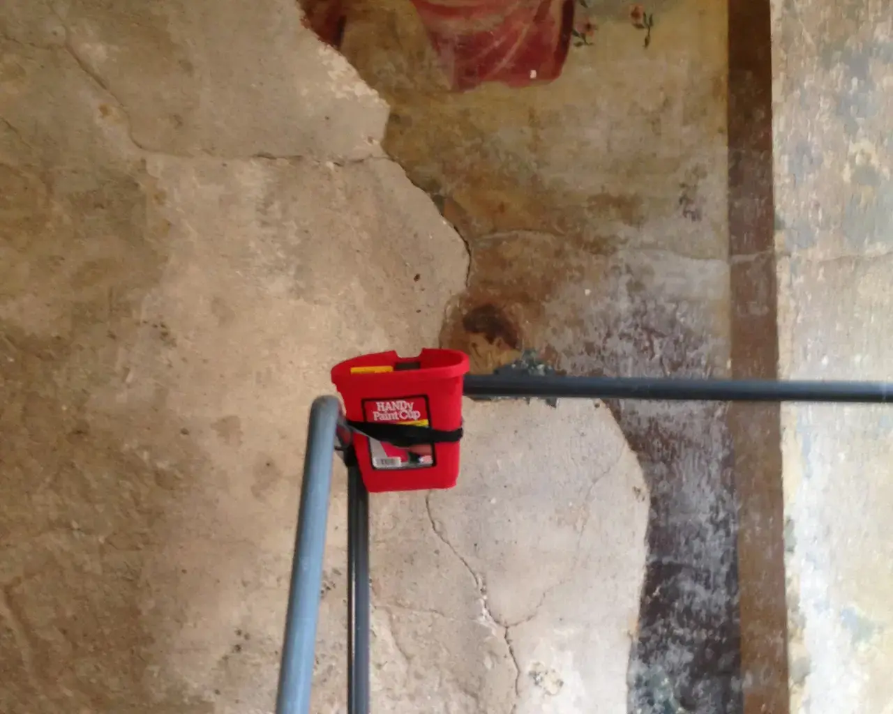 Penitent Prisoner mural at Eastern State Penitentiary, conserved in October, 2013.The detached portion of the Penitent Prisoner was removed in order to save it until conservation treatment began in 2013. Photo courtesy of Eastern State Penitentiary.