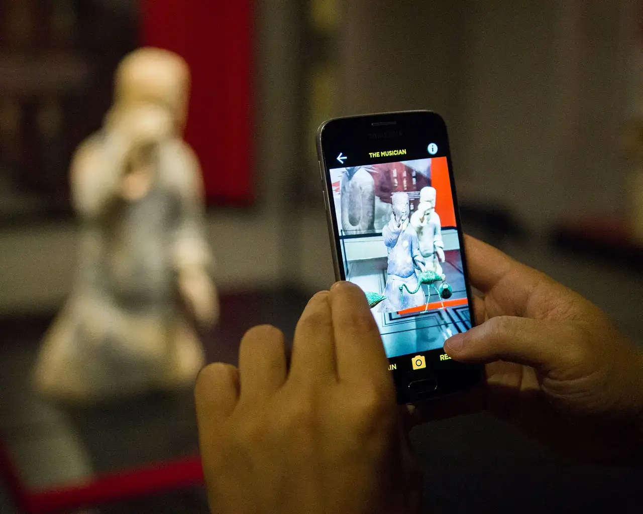 Terracotta Warriors of the First Emperor, mobile app with augmented reality. Photo by Lendl Tellington, courtesy of The Franklin Institute.