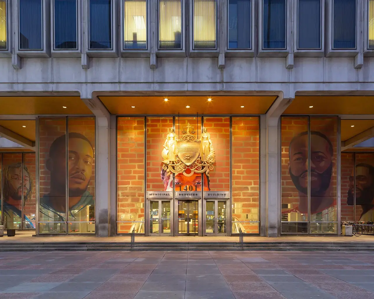 Russell Craig and Jesse Krimes, Portraits of Justice, 2018, Municipal Services Building, Philadelphia, PA. Photo by Steve Weinik, courtesy of Mural Arts Philadelphia.