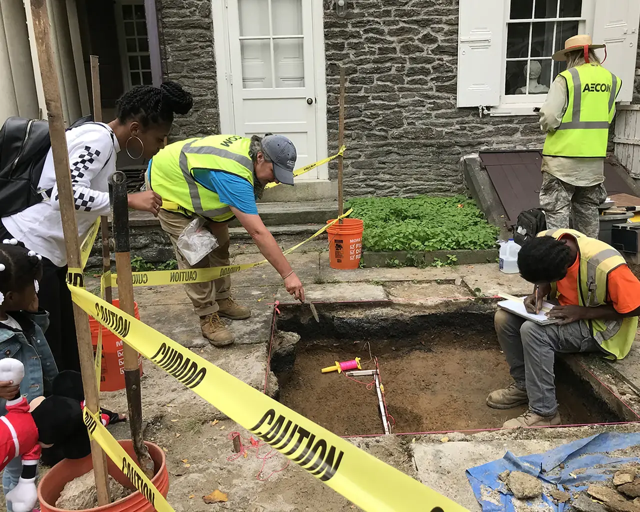 Cliveden of the National Trust, visitors observe an archaeological investigation of the work yard at Cliveden, 2021. Photo by Libbie Hawes.