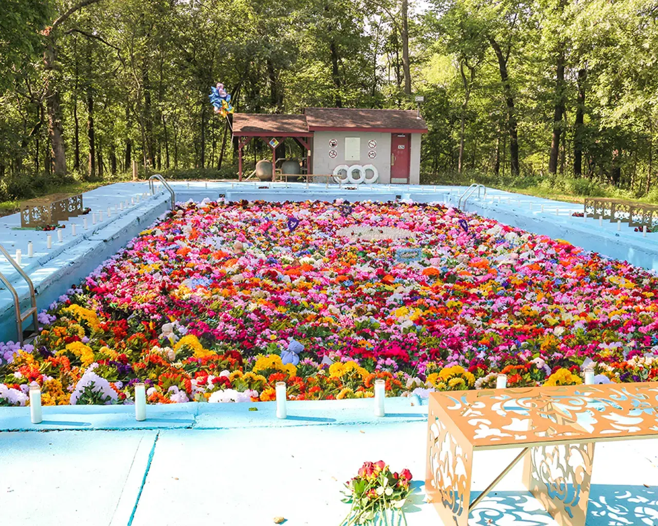 Ebony G. Patterson, ...called up,&nbsp;2018, installation in abandoned pool, part of Open Spaces festival in Kansas City. Photo courtesy of The Village of Arts and Humanities.