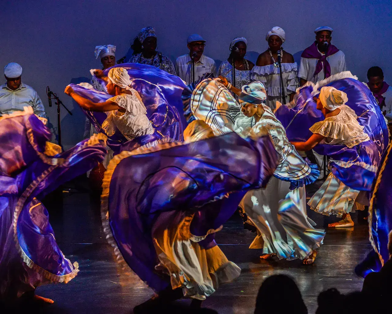 Kùlú Mèlé African Dance and Drum Ensemble performing Yemaya, 2014. Photo by Jaci Downs.