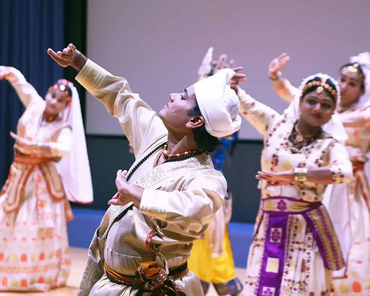 Madhusmita Bora and Sattriya Dance Company with The Dancing Monks of Assam in performance at The Philadelphia Museum of Art. Photo by Bill Hebert, courtesy Madhusmita Bora.