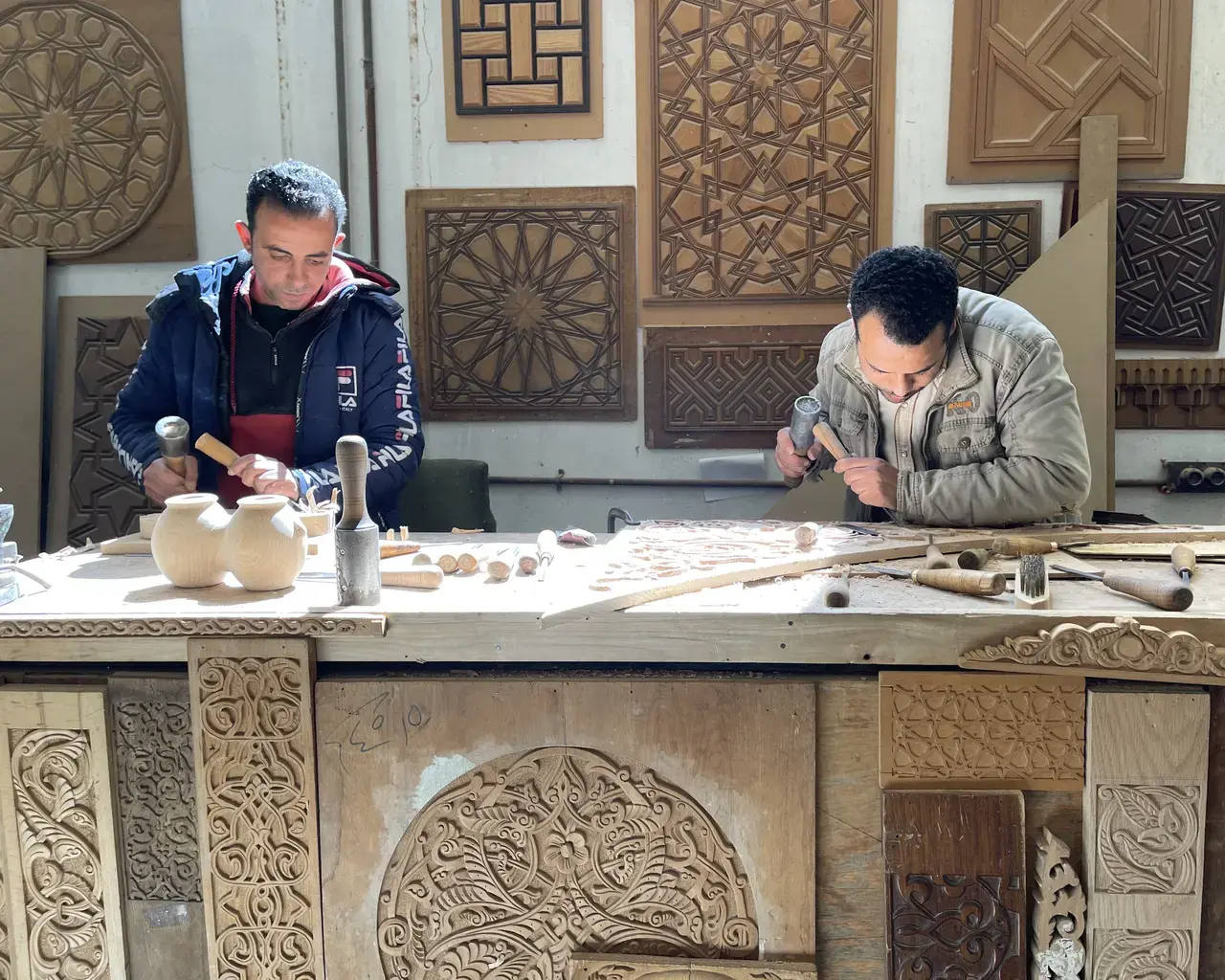 Woodcarving craftsmen at NADIM Industries furniture division, Giza, Egypt. Photo courtesy of Museum for Art in Wood.