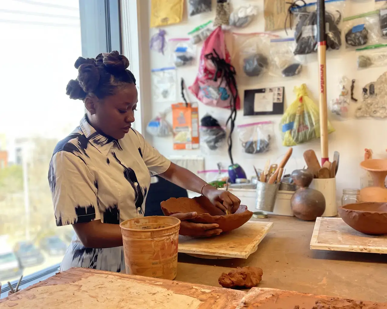 Pew Fellow Adebunmi Gbadebo works in her studio at The Clay Studio.