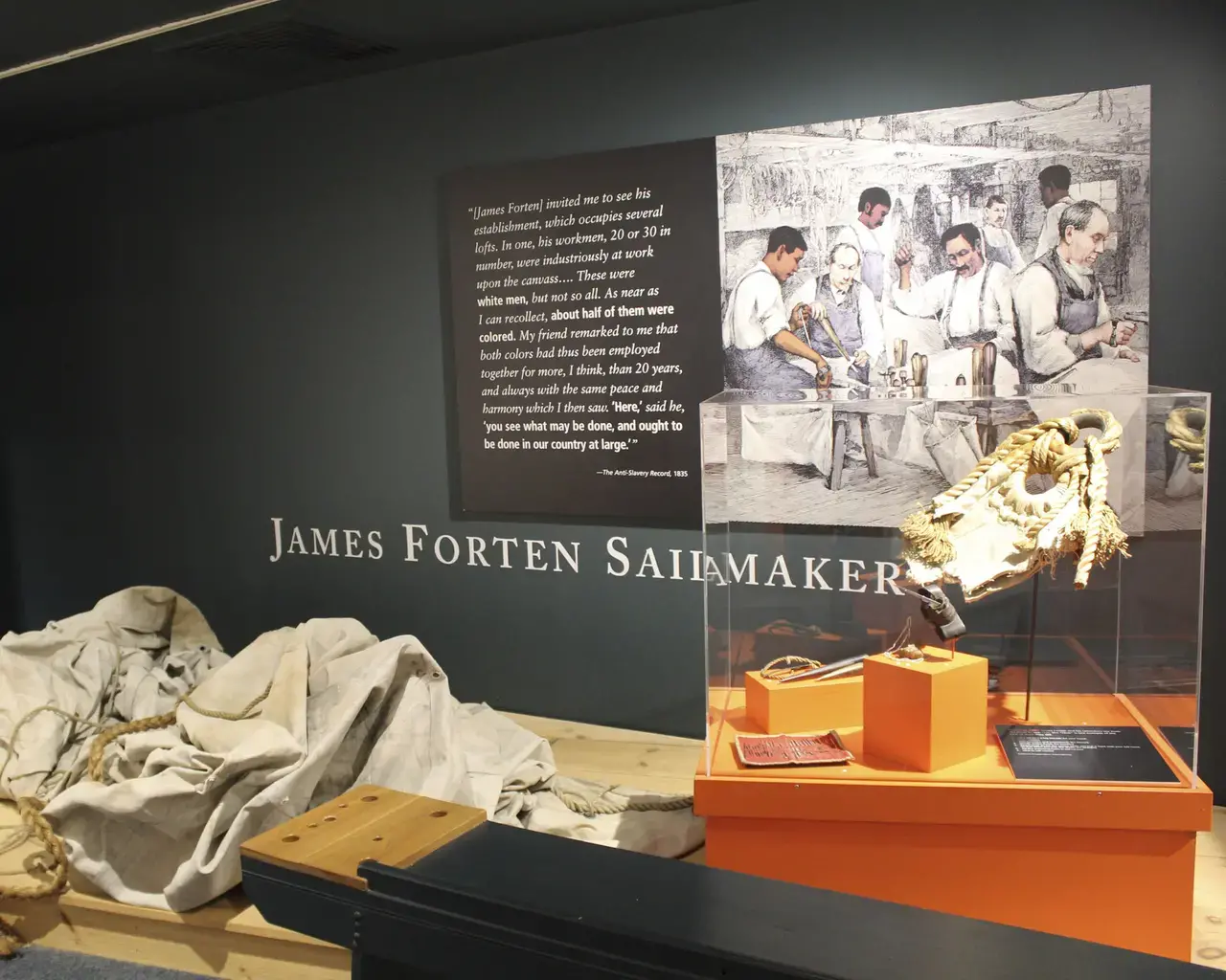 An exhibit about James Forten, a Philadelphia sailmaker who fought in the Revolutionary War and employed both white and black workmen who worked alongside one another, at Independence Seaport Museum.