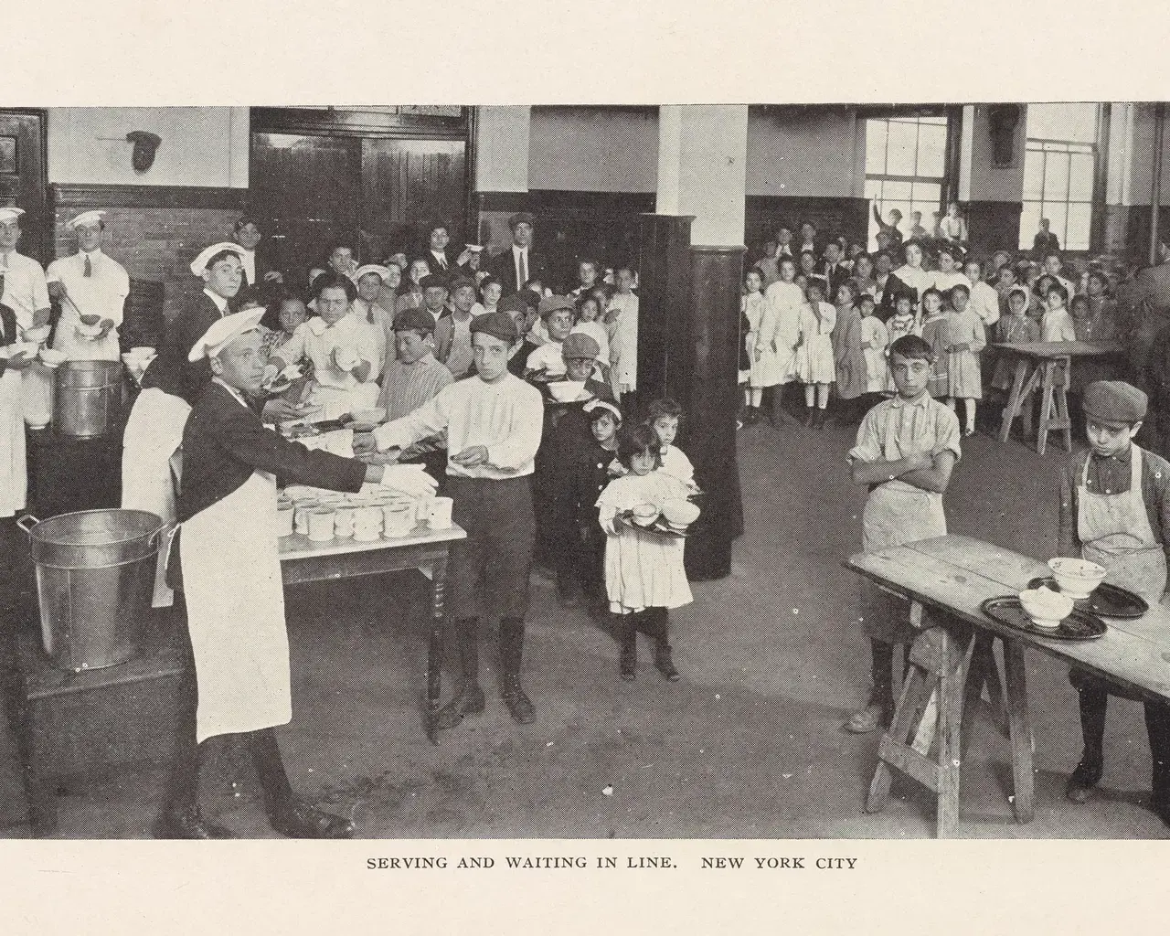 A lunchroom in early twentieth-century New York City, pictured in School Feeding: Its History and Practice at Home and Abroad (1913).