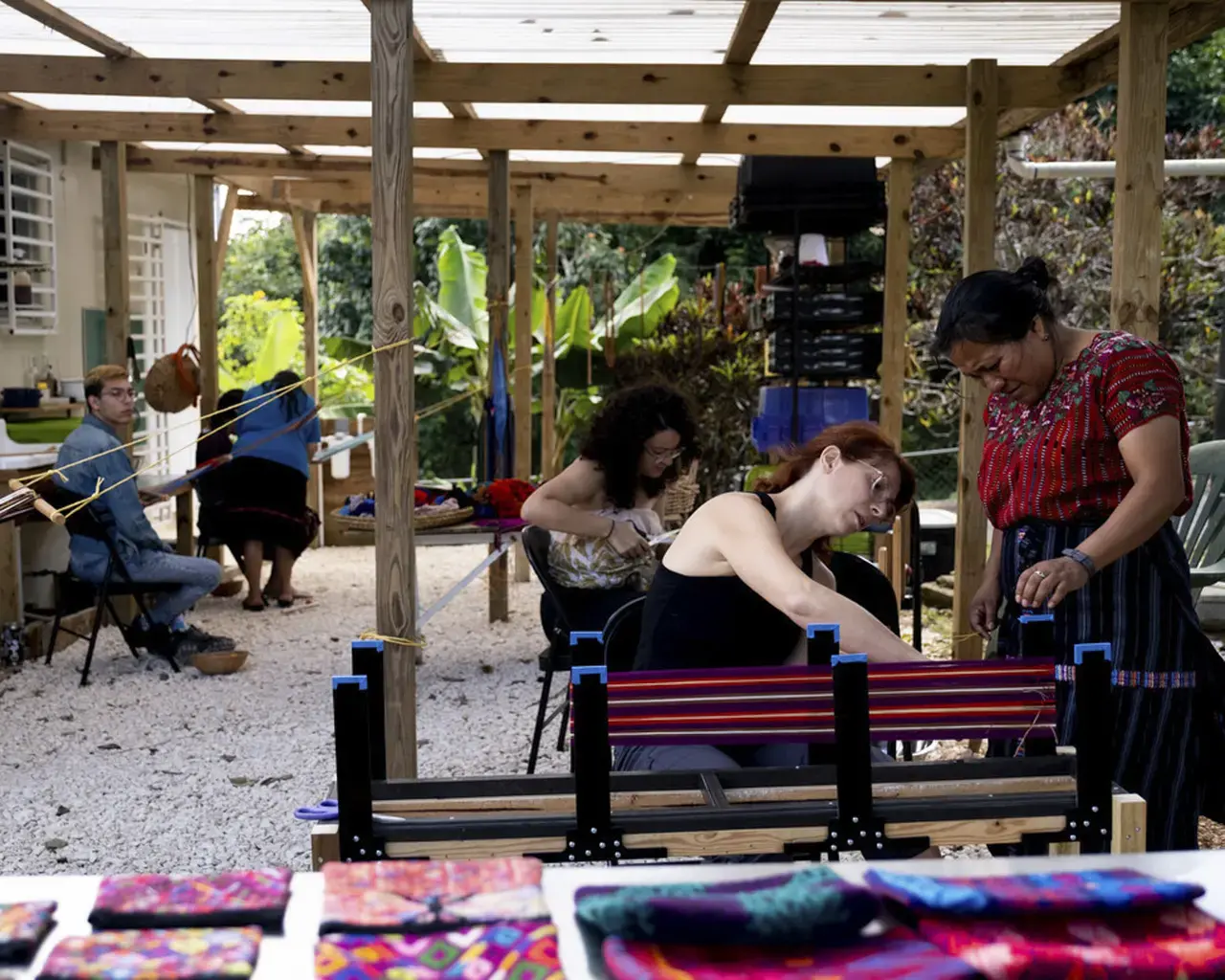 A loom weaving workshop hosted by textile collectives Trama Antillana and Trama Textiles in Aibonito, Puerto Rico.