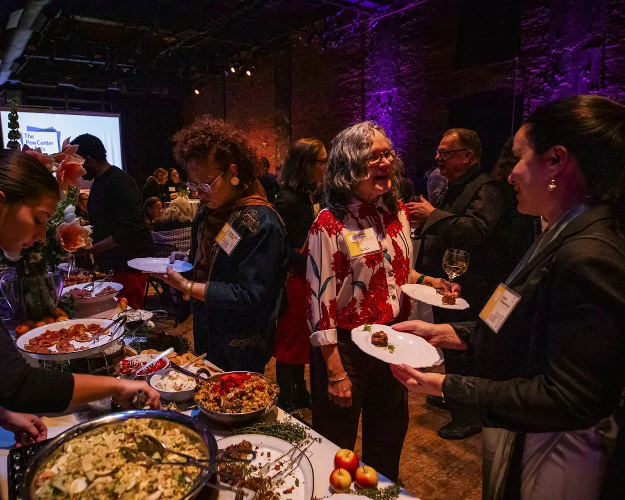 Foreground: Nasheli Ortiz González (Executive Director, Taller Puertorriqueño), Teresa Jaynes (Project Manager, William Way LGBT Community Center), and Emily Zimmerman (Interim Director of Exhibitions and Programs, Arthur Ross Gallery). Photo by Ashley Smith, Wide Eyed Studios.