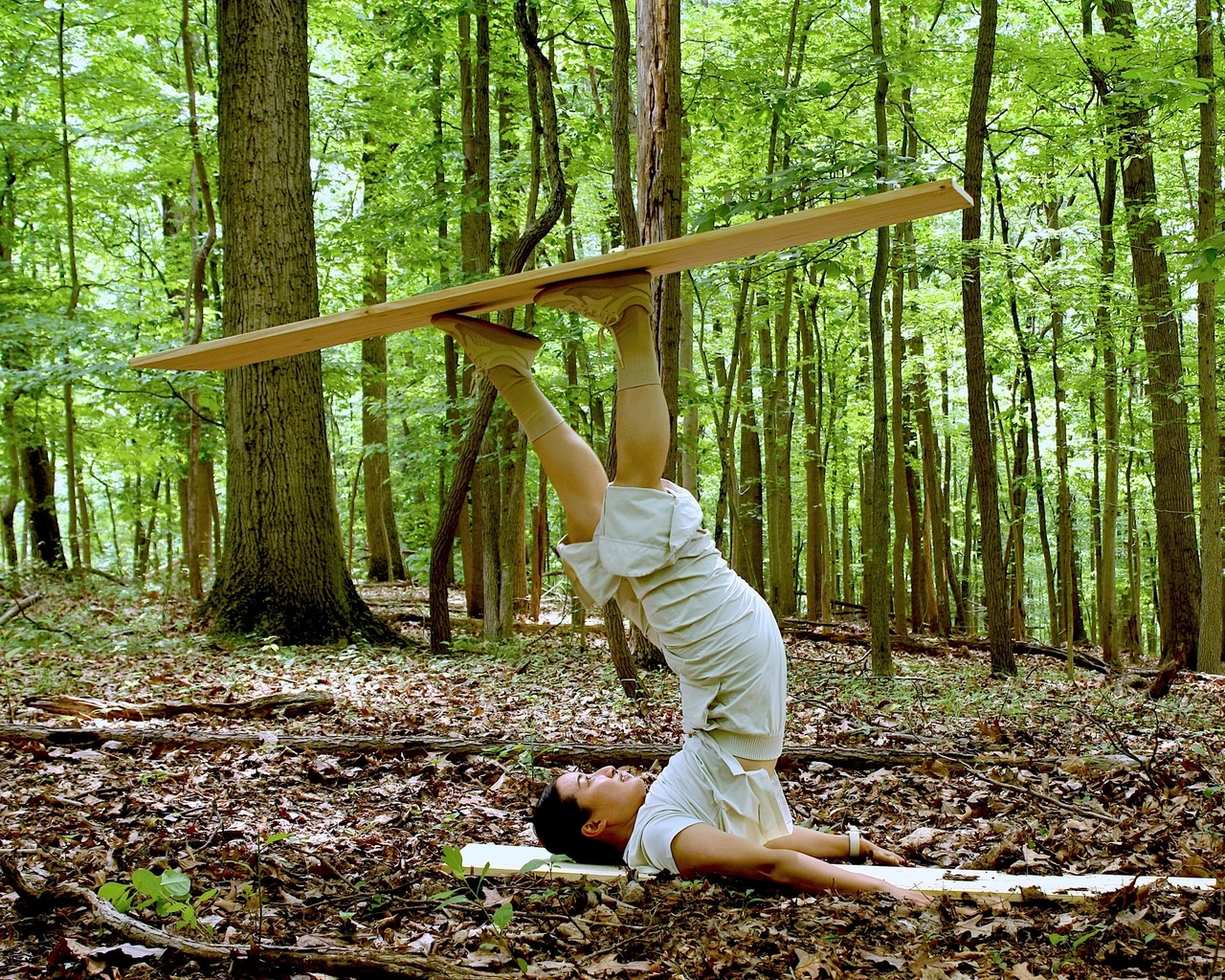 Muyu Ruba performs in Bodies and Territories, directed and choreographed by Silvana Cardell, Schuylkill Center for Environmental Education. The Schuylkill Center is presenting the site-specific dance performance. Photo by Paula Meninato.