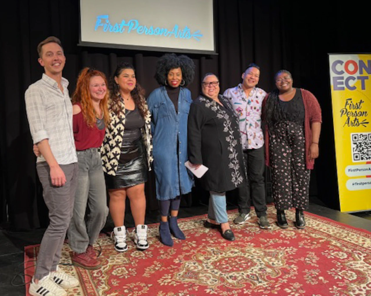 The Theatre 215: I Hope You Get It StorySlam, 2024, First Person Arts. Pictured: Christian Ryan, Jenna Kuerzi, Gabi Sanchez, Zuhairah Mcgill, Jamie J. Brunson, Justin Jain, and Sharese Salters. Photo by Jean Burke-Spraker.&nbsp;