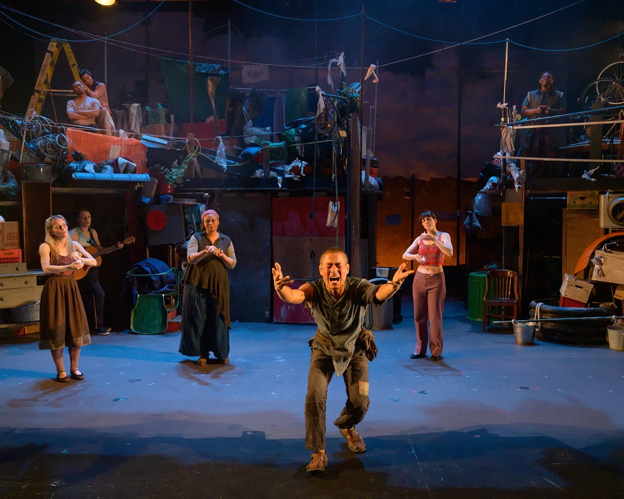 Jungwoong Kim and cast in Bertolt Brecht’s The Good Person of Setzuan, The Wilma Theater, 2024. Photo by Johanna Austin.