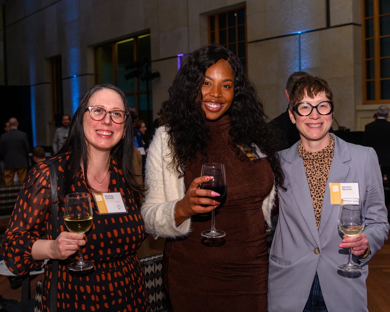 Michele Scherch (Managing Director, Black Pearl Chamber Orchestra) with Chelsey Luster (Exhibition Manager, Philadelphia's Magic Gardens) and Annette Monnier (Development Manager, Philadelphia's Magic Gardens).&nbsp;Photo by Constance Mensh.