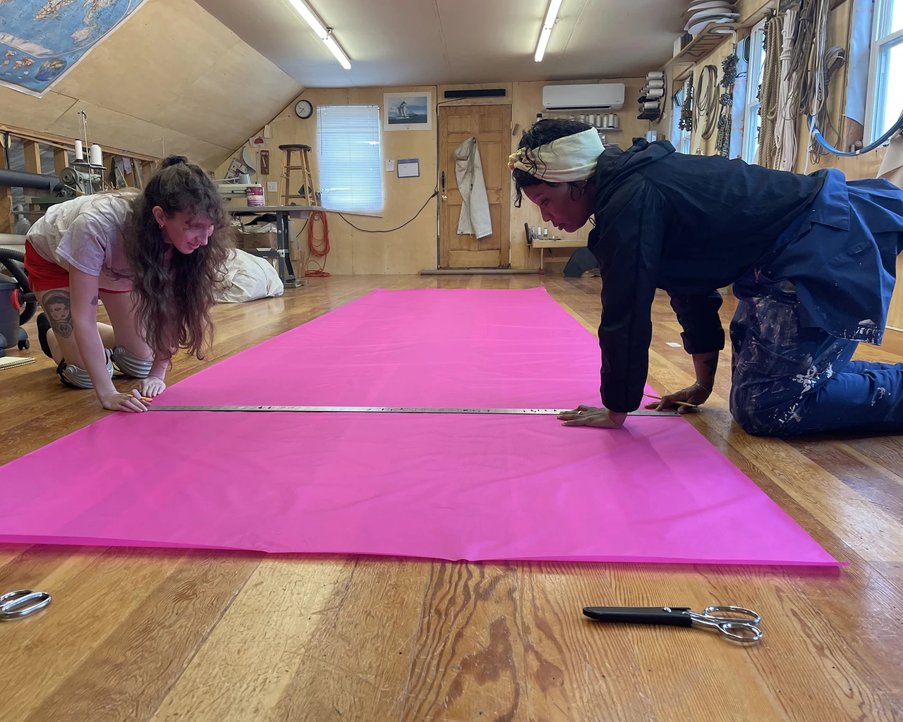 Indira Allegra (right) and Olivia Dwyer marking a sail, 2025. Photo by Dayle Ward.