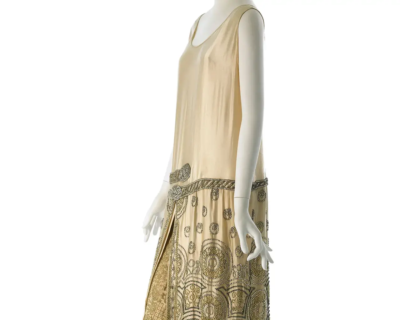 Worth, Evening Dress, 1924-27, ivory satin, silver metallic machine-made lace, mine-cut brilliants. Photo courtesy of the Museum of the City of New York.