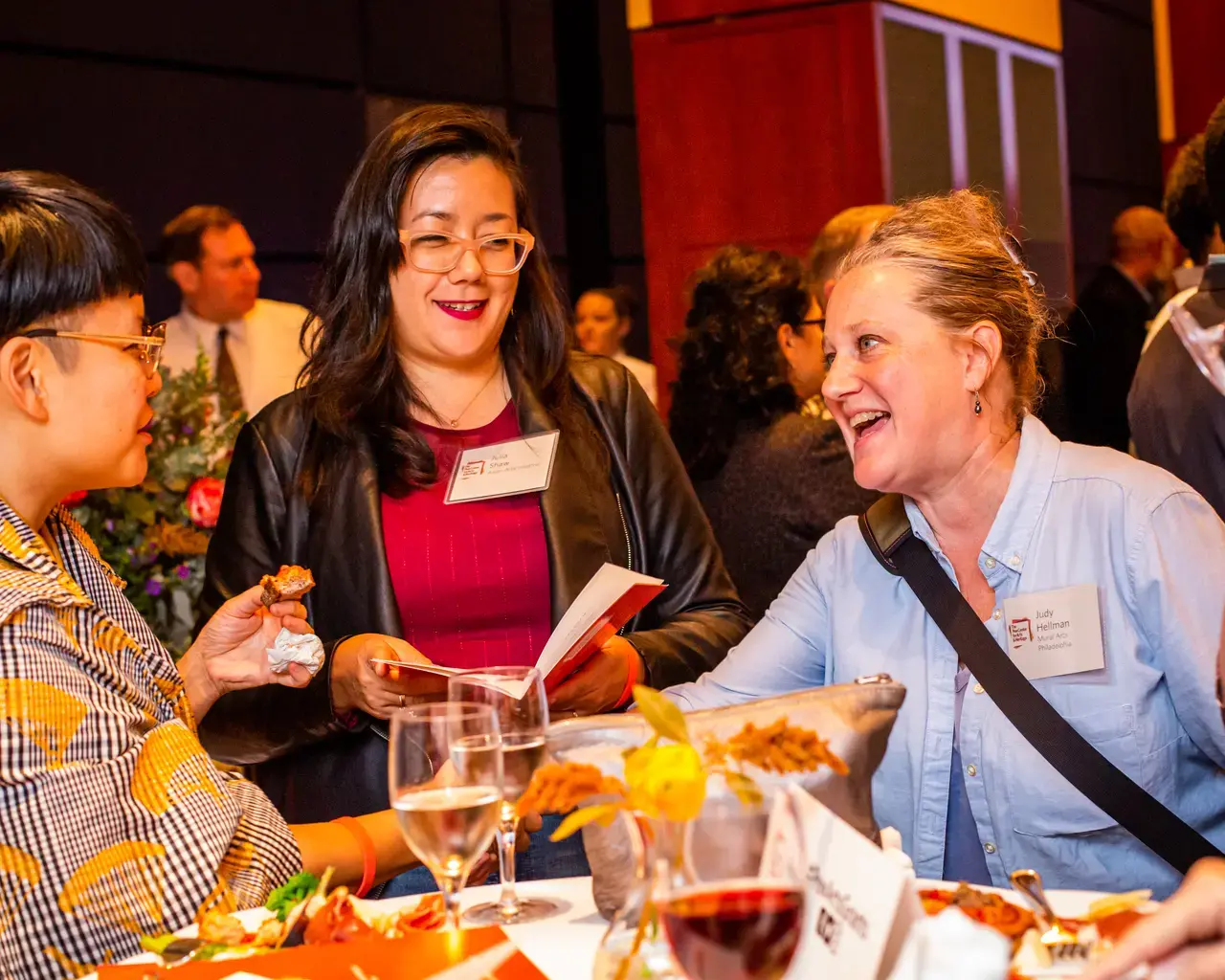 From left to right: Anne Ishii and Julia Shaw of Asian Arts Initiative and Judy Hellman of Mural Arts Philadelphia. Photo by Ashley Smith of Wide Eyed Studios.