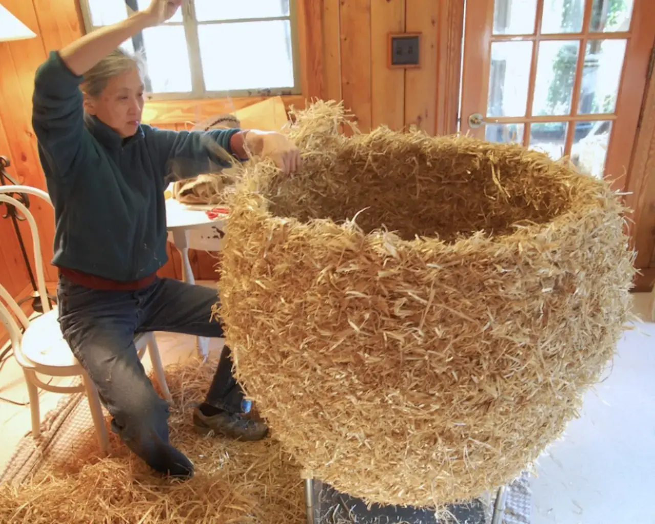 Mei-ling Hom, Mushroom Bump, 2013, straw, sisal twine, pleurotus ostreatus spawn, 26&rdquo; x 26&rdquo; x 30&rdquo; installed at the GrowDat Youth Farm in the New Orleans City Park. Photo courtesy of the artist.