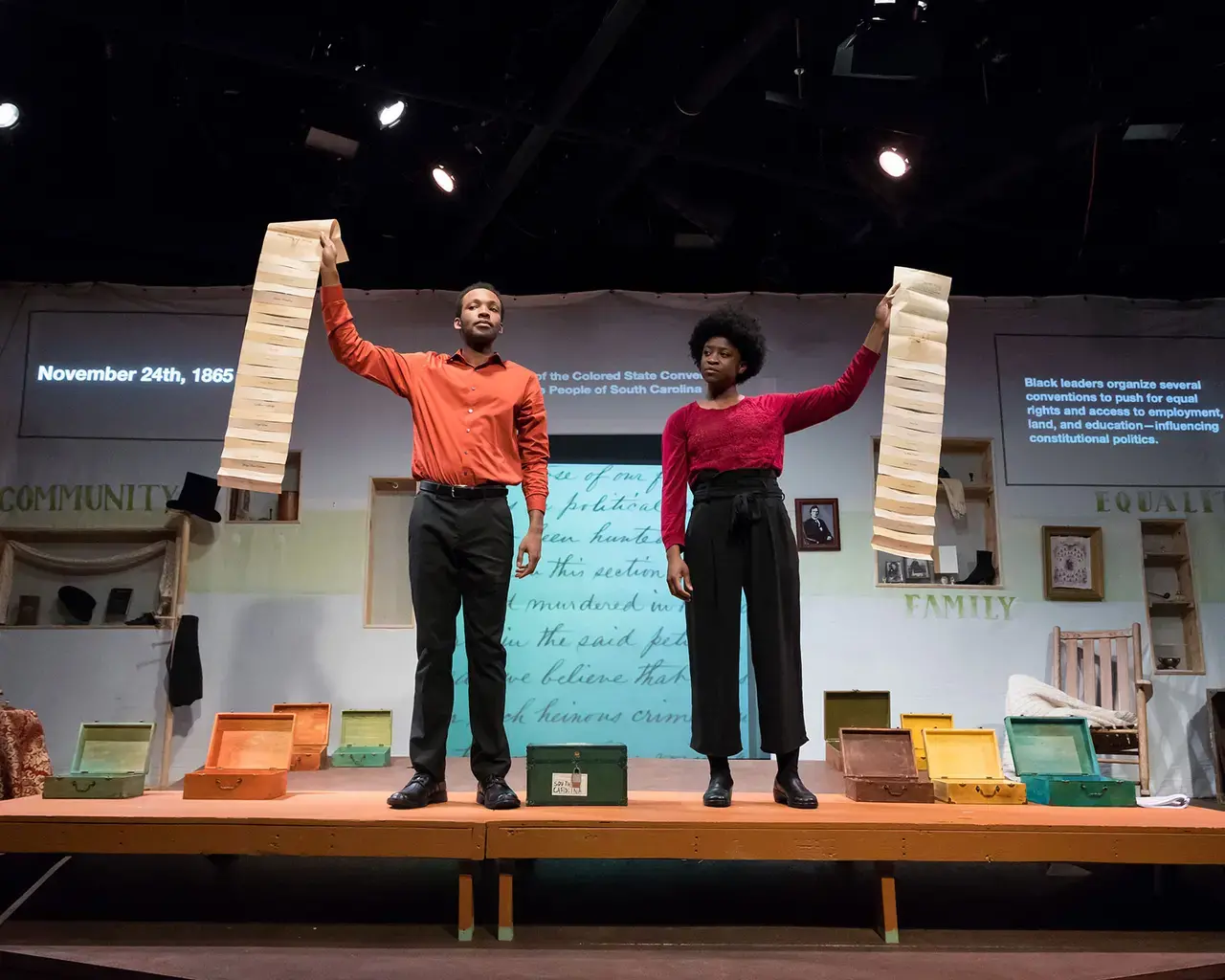 Reconstruction and the Fourteenth Amendment Project workshop performance. Performers Brandon Pierce and Brett Robinson display the list of names of freed people in South Carolina, petitioning the federal government for equal rights. Photo by Daniel Kontz.