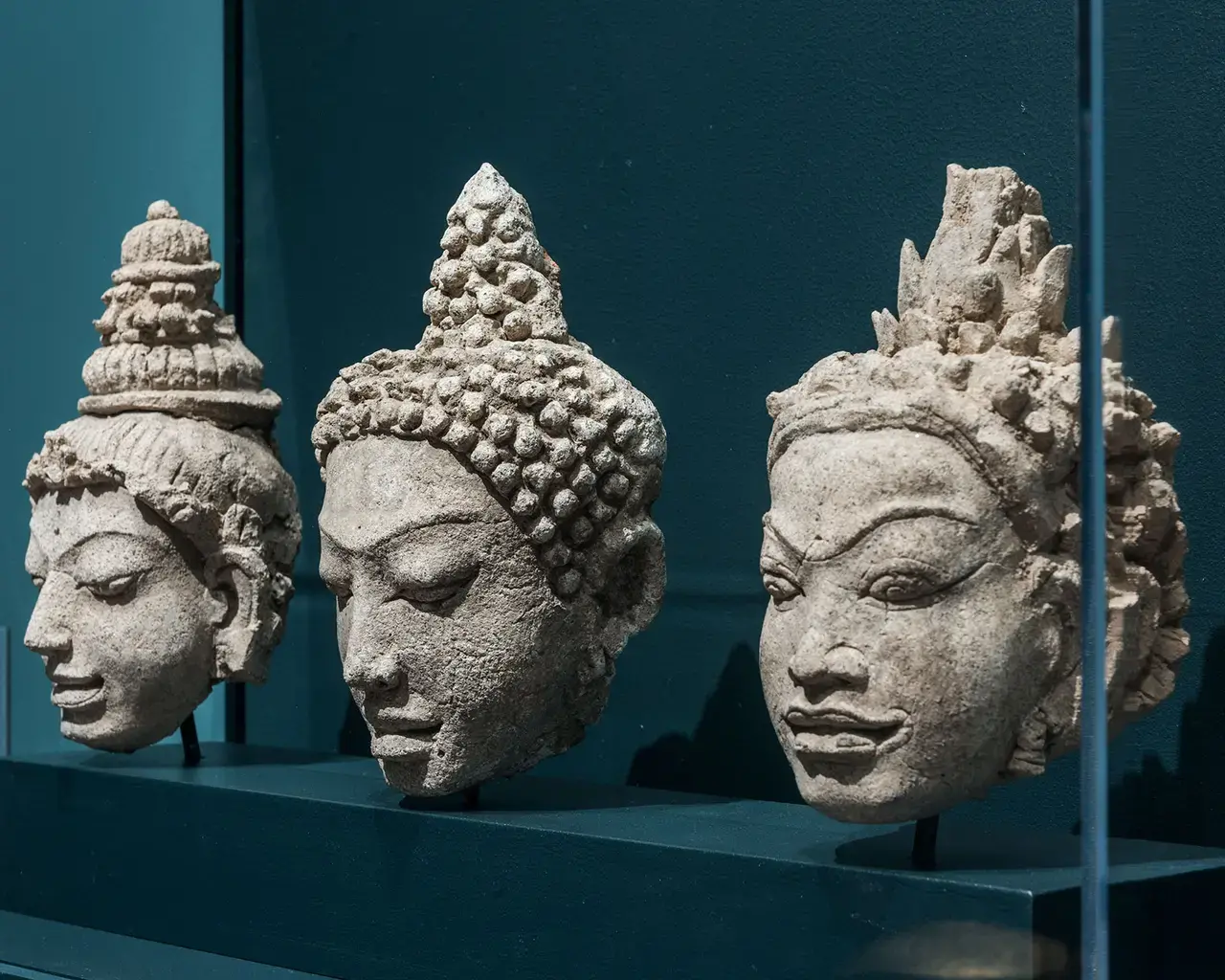 Three Thai sculptures from the 8th-9th centuries, newly installed together in the Indian and Himalayan Galleries, heads of Bodhisattva, Buddha, and a Buddhist Attendant. Photo courtesy of Philadelphia Museum of Art.