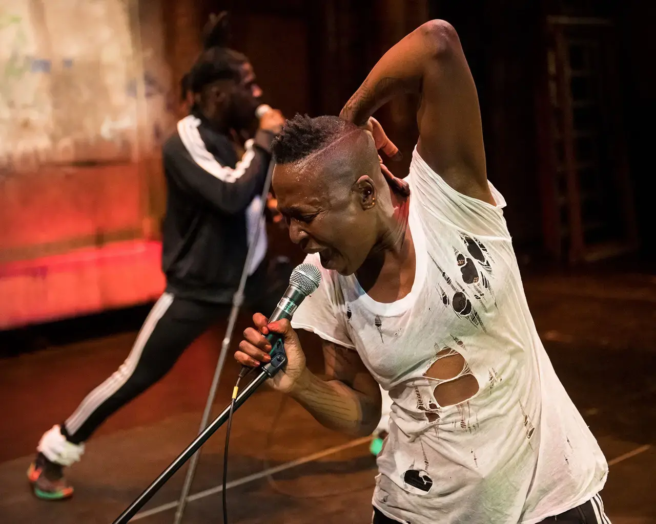 University of the Arts School of Dance, Nora Chipaumire, "#PUNK" performance shot. Pictured: Nora Chipaumire and Shamar Watt. Photo by Ian Douglas.