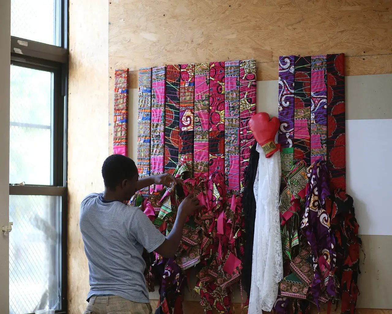 Community collaborator working on Olanre Tejuoso&rsquo;s Material Memory. Photo by Breanne Furlong.