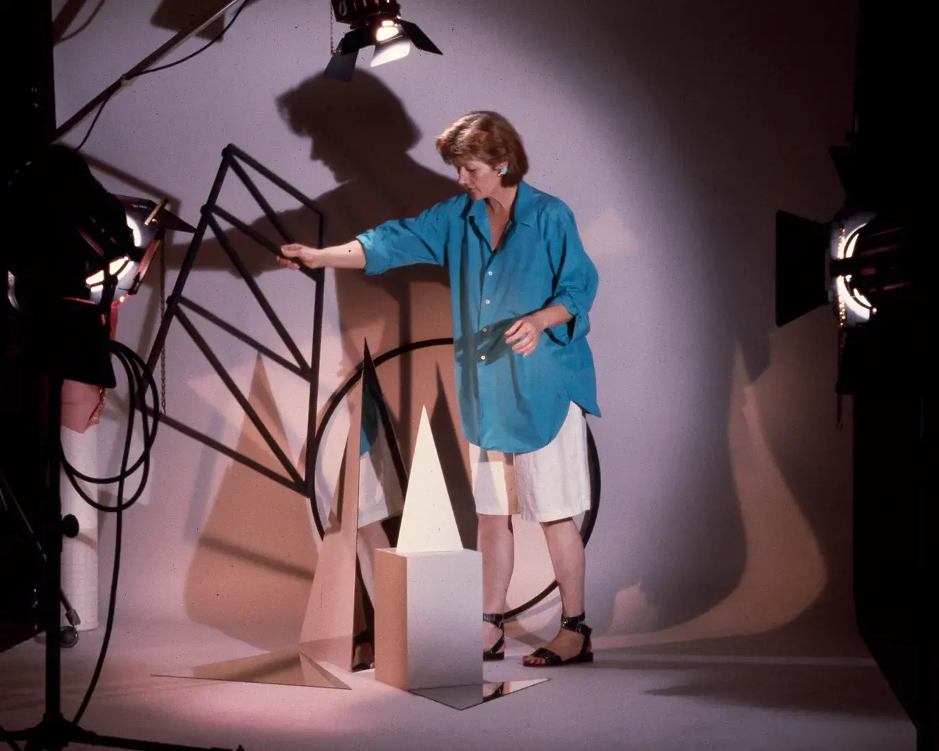 Documentation of Barbara Kasten working in her studio, New York, NY, 1983. Photo courtesy of the artist.
