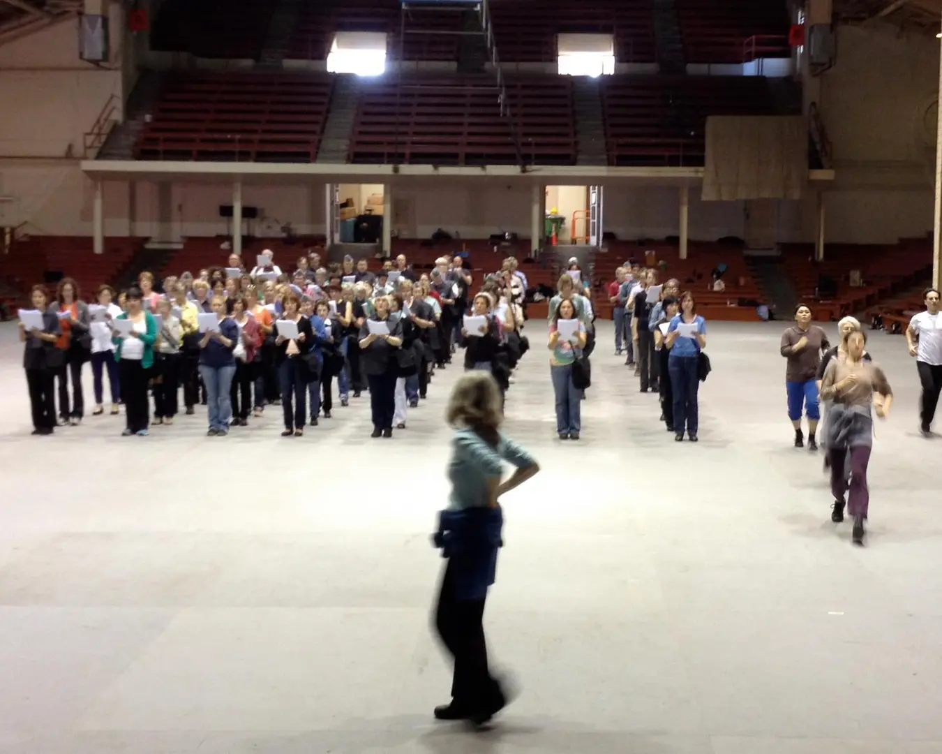 Leah Stein directs Battle Hymns&nbsp;singers and dancers at Kezar Pavilion in April 2013, set to a libretto based on Civil War texts. Photo by Sidney Chen.