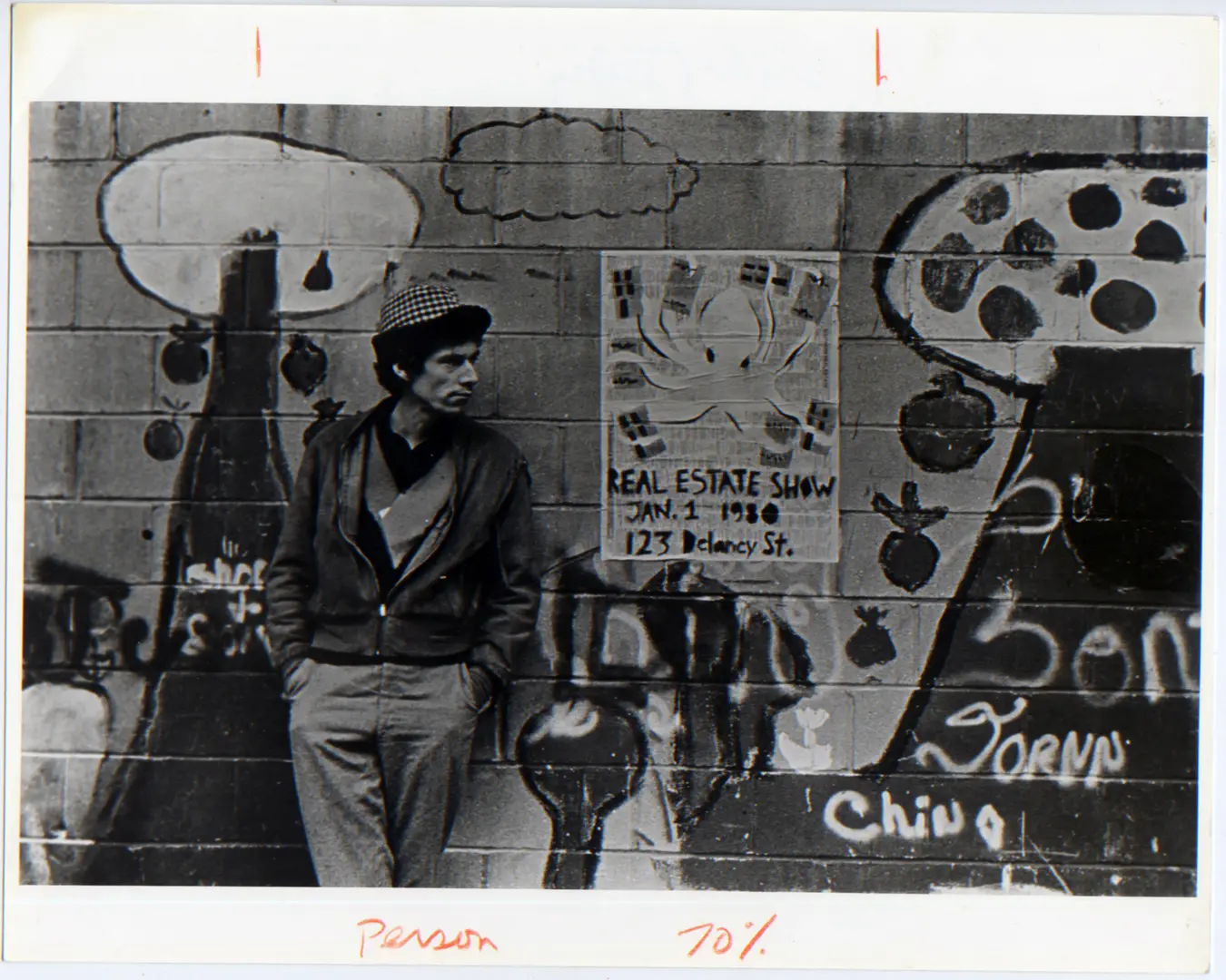 Alan W. Moore next to Becky Howland&#39;s octopus poster for The Real Estate Show. Photo &copy; 1980 Becky Howland.
