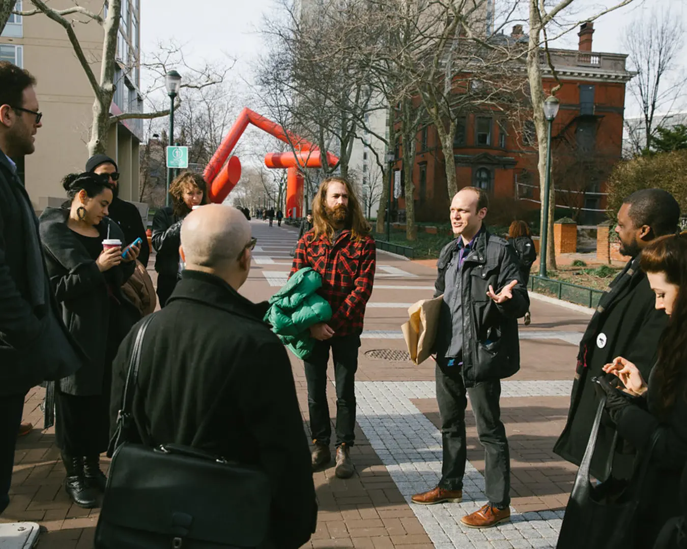 Curator Daniel Tucker leads a group tour of historian Brad Duncan&rsquo;s self-determination archives. Photo by Paul Gargagliano of Hazel Photo, Courtesy of Daniel Tucker.