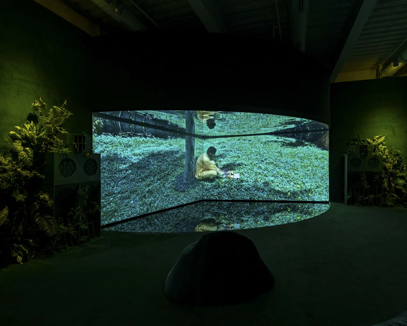 Terence Nance, Swimming In Your Skin Again, 2015; video, two-channel projection, water, mirror, plants, sound system; installation view at the Institute of Contemporary Art, Philadelphia, PA. Photo by Constance Mensh. &nbsp;&nbsp;