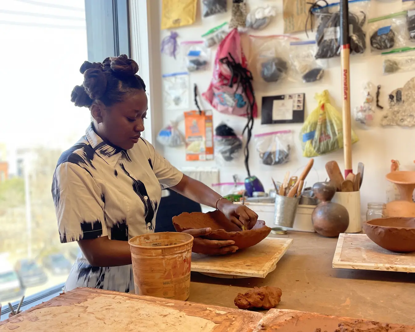 Pew Fellow Adebunmi Gbadebo works in her studio at The Clay Studio.