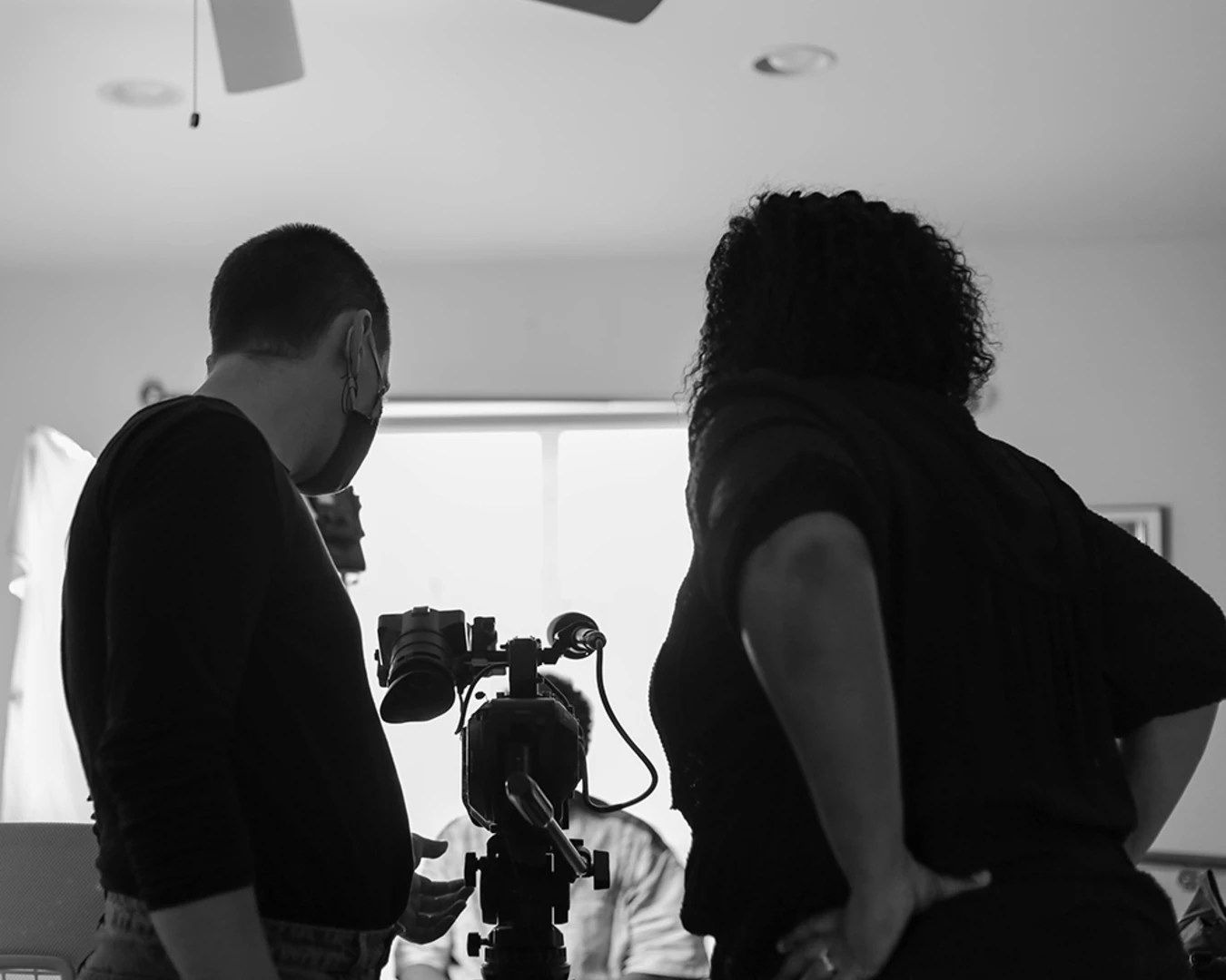 Pew Fellow Jos Duncan Asé (right) and cinematographer Marie Hinson behind the scenes on set of Queen Mother: Falaka Fattah &amp; The House of Umoja film shoot. Photo by Tezarah Wilkins.
